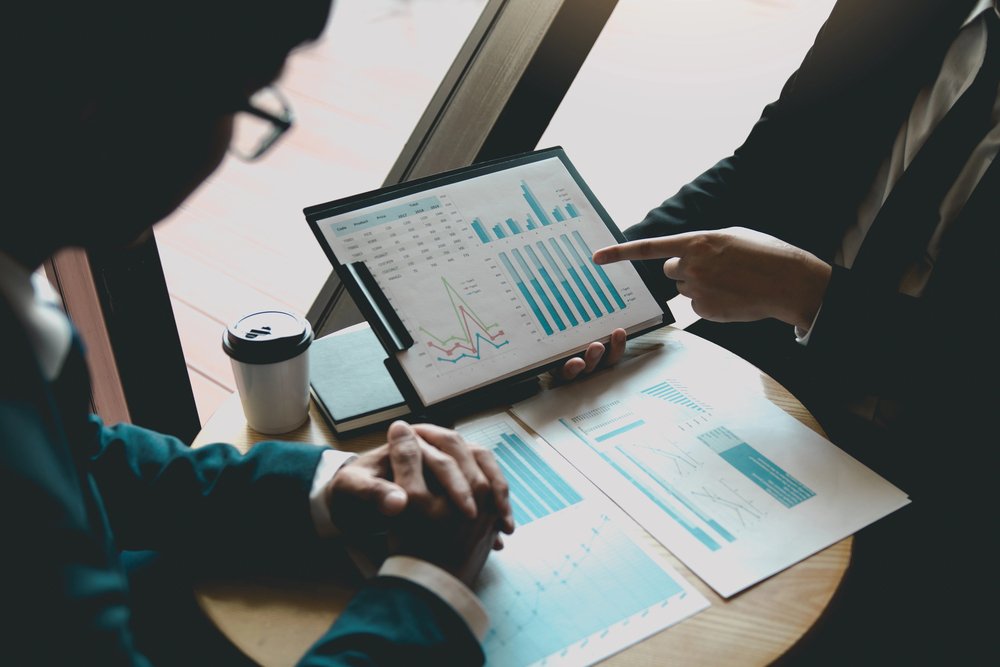 discussing financial planning for equitable asset division with a professional.